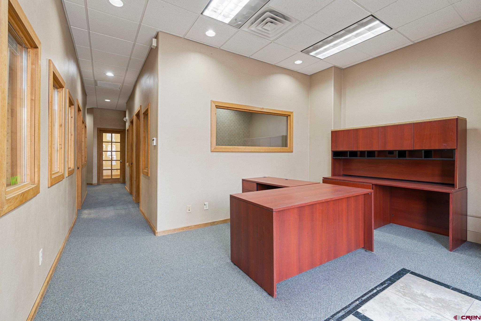 1150 Main Avenue Durango, CO 81301 - Photo 20 of 35 a kitchen that has a lot of cabinets in it