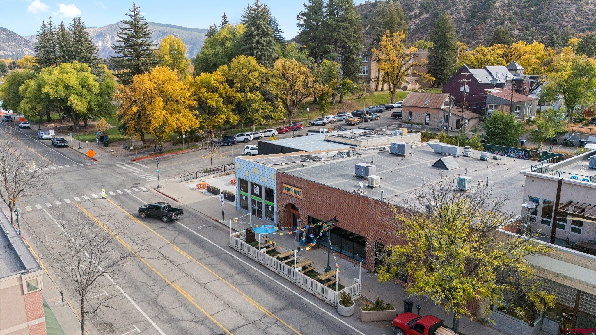 1150 Main Avenue Durango, CO 81301 - Photo 3 of 35 a view of a house with a yard and sitting area