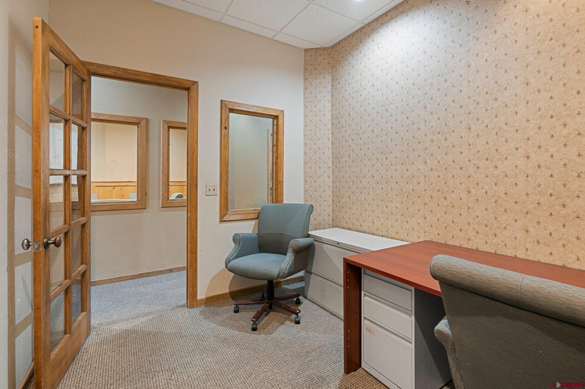 1150 Main Avenue Durango, CO 81301 - Photo 31 of 35 a workspace with furniture and a window