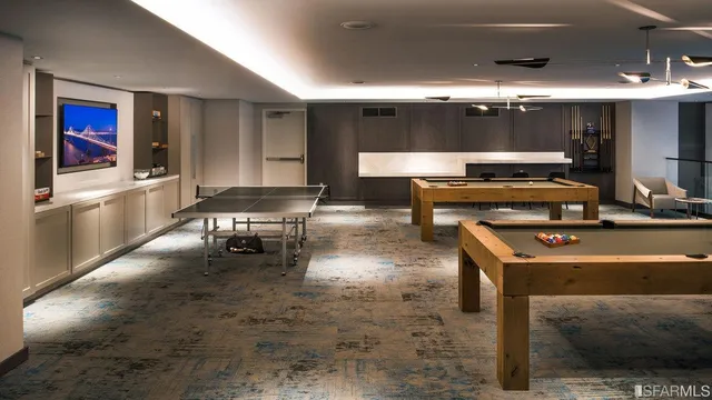 a play room with toys and wooden floor