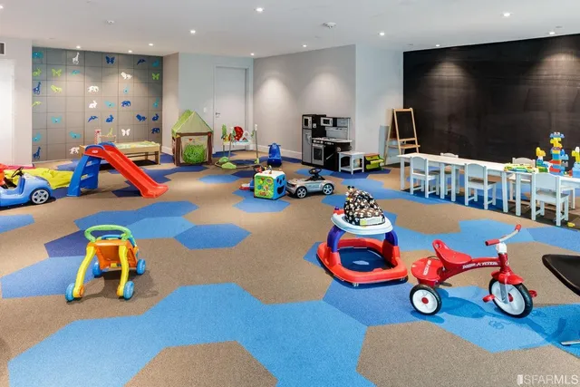 a view of workspace and wooden floor in a room