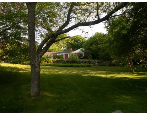 42 Longmeadow Road Weston, MA 02493 - Photo 6 of 7 a view of a golf course with a trees