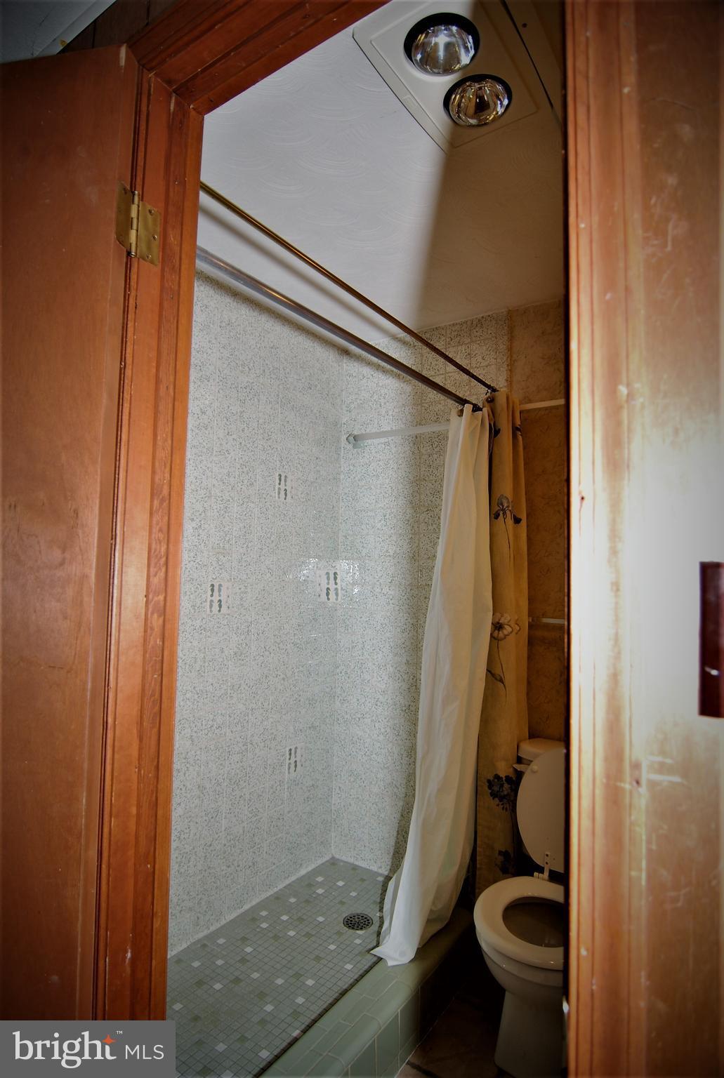 6712 South Clifton Road Frederick, MD 21703 - Photo 16 of 28 a bathroom with a shower