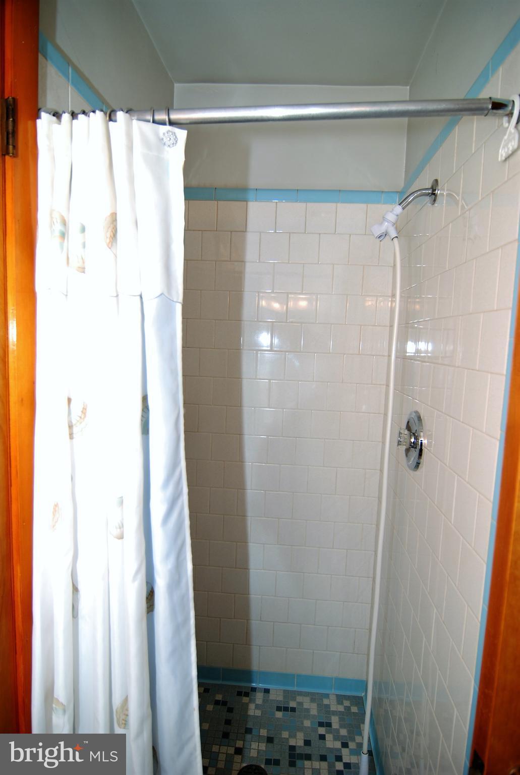 6712 South Clifton Road Frederick, MD 21703 - Photo 9 of 28 a bathroom with a shower