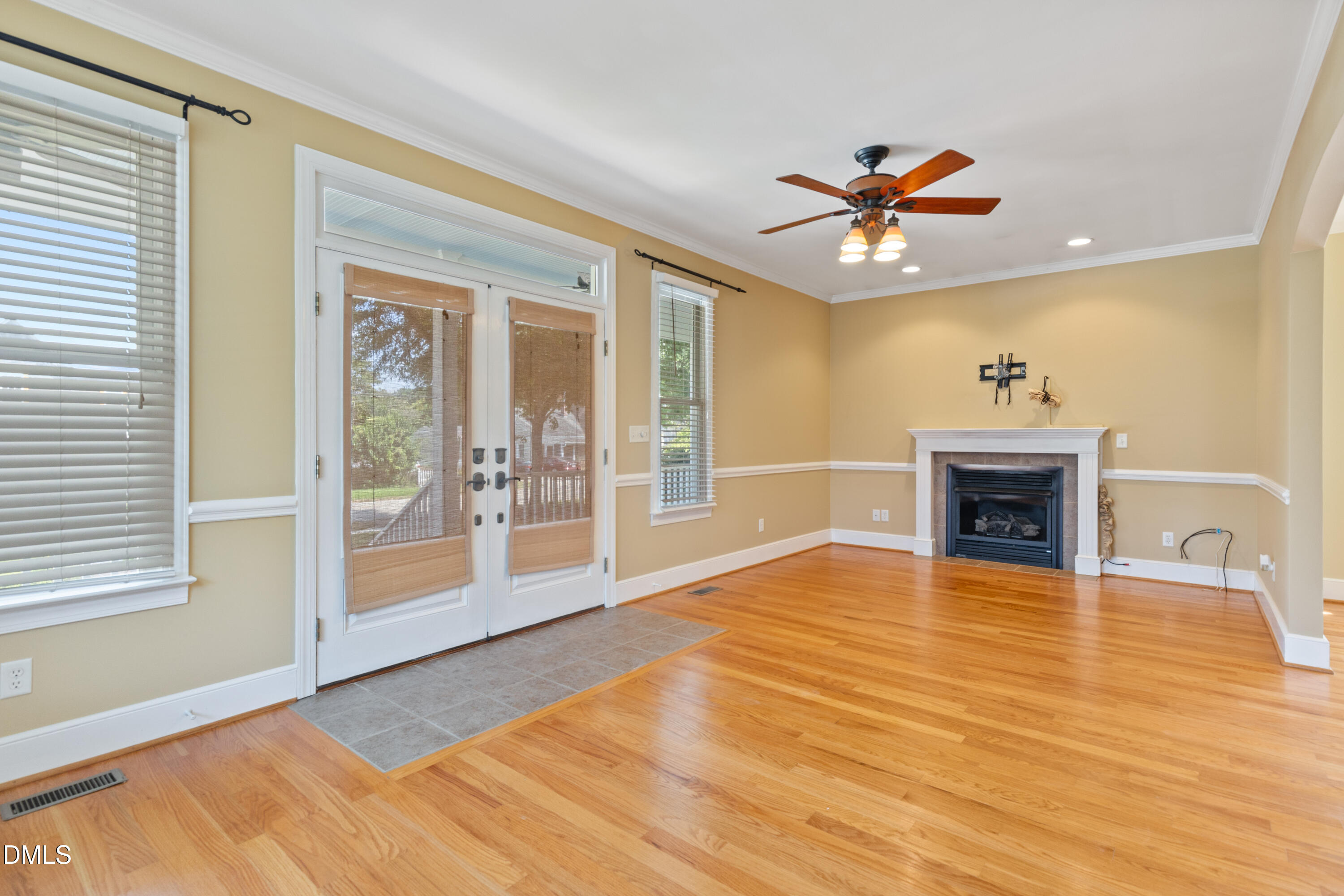 207 North Hopkins Avenue Spring Hope, NC 27882 - Photo 17 of 41 Living and Fireplace