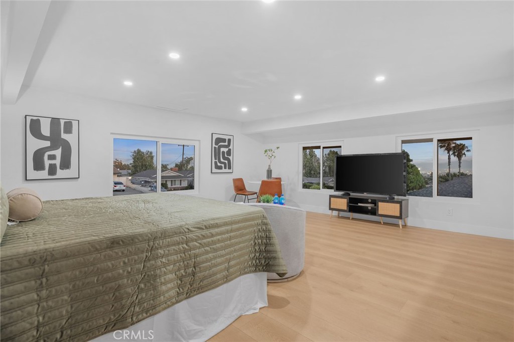 6210 Halsted Avenue Rancho Cucamonga, CA 91737 - Photo 19 of 21 a bedroom with furniture and a flat screen tv