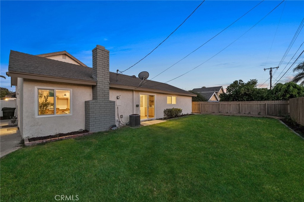 6210 Halsted Avenue Rancho Cucamonga, CA 91737 - Photo 2 of 21 a front view of house with yard and outdoor seating
