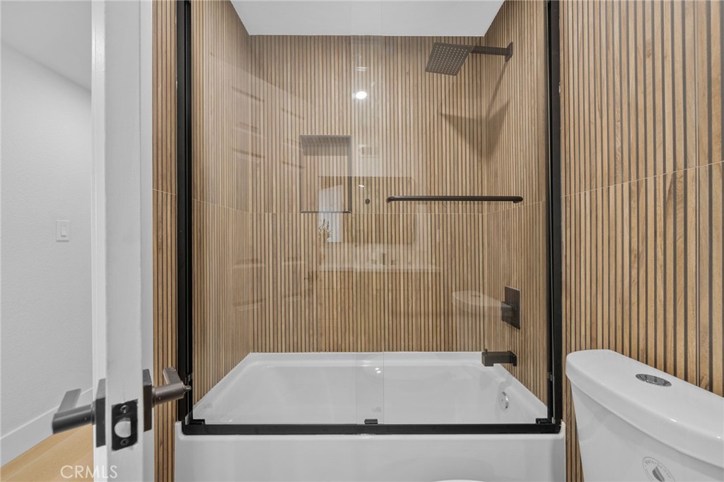 6210 Halsted Avenue Rancho Cucamonga, CA 91737 - Photo 9 of 21 a bathroom with a tub and a shower