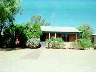 1641 East Hampton Street Tucson, AZ 85719 - Photo 1 of 1 a front view of house with yard and green space