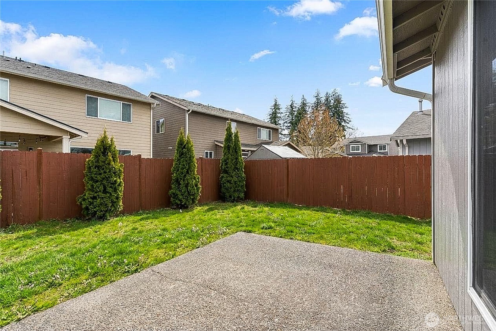 924 Merea Lane Sultan, WA 98294 - Photo 30 of 30 a view of backyard with potted plants and wooden fence