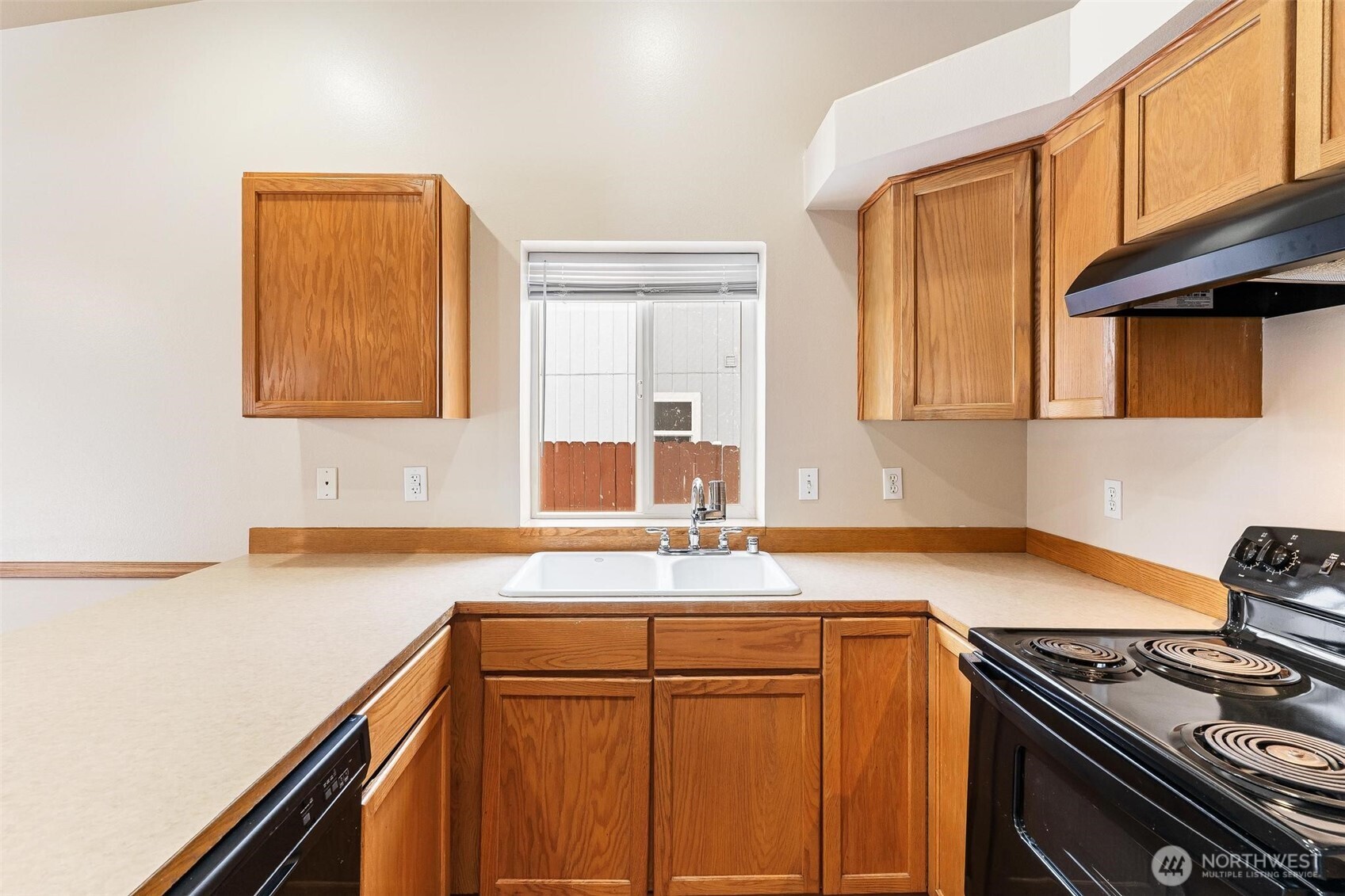 924 Merea Lane Sultan, WA 98294 - Photo 6 of 30 a kitchen with stainless steel appliances granite countertop a sink stove and cabinets