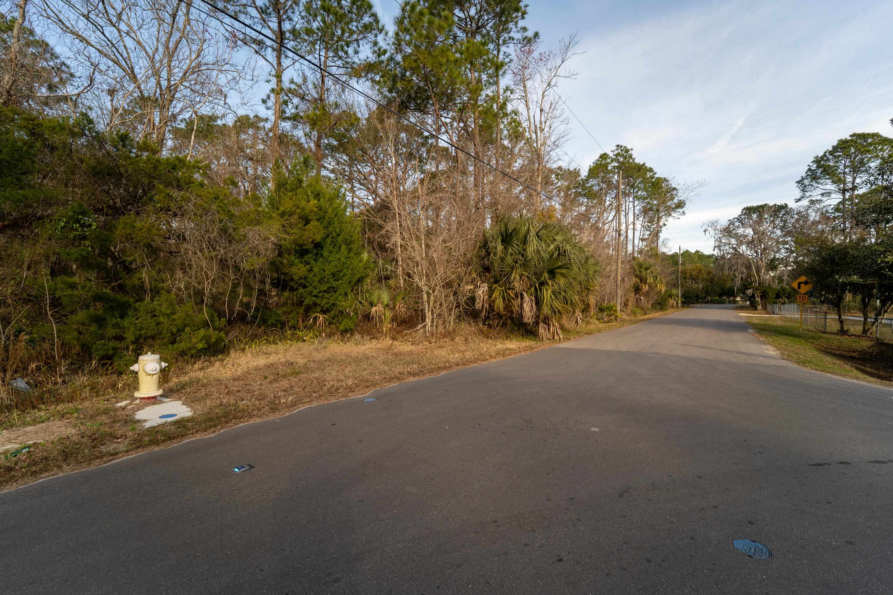 0 North Clay Street St. Augustine, FL 32084 - Photo 16 of 21 View of asphalt road with traffic signs