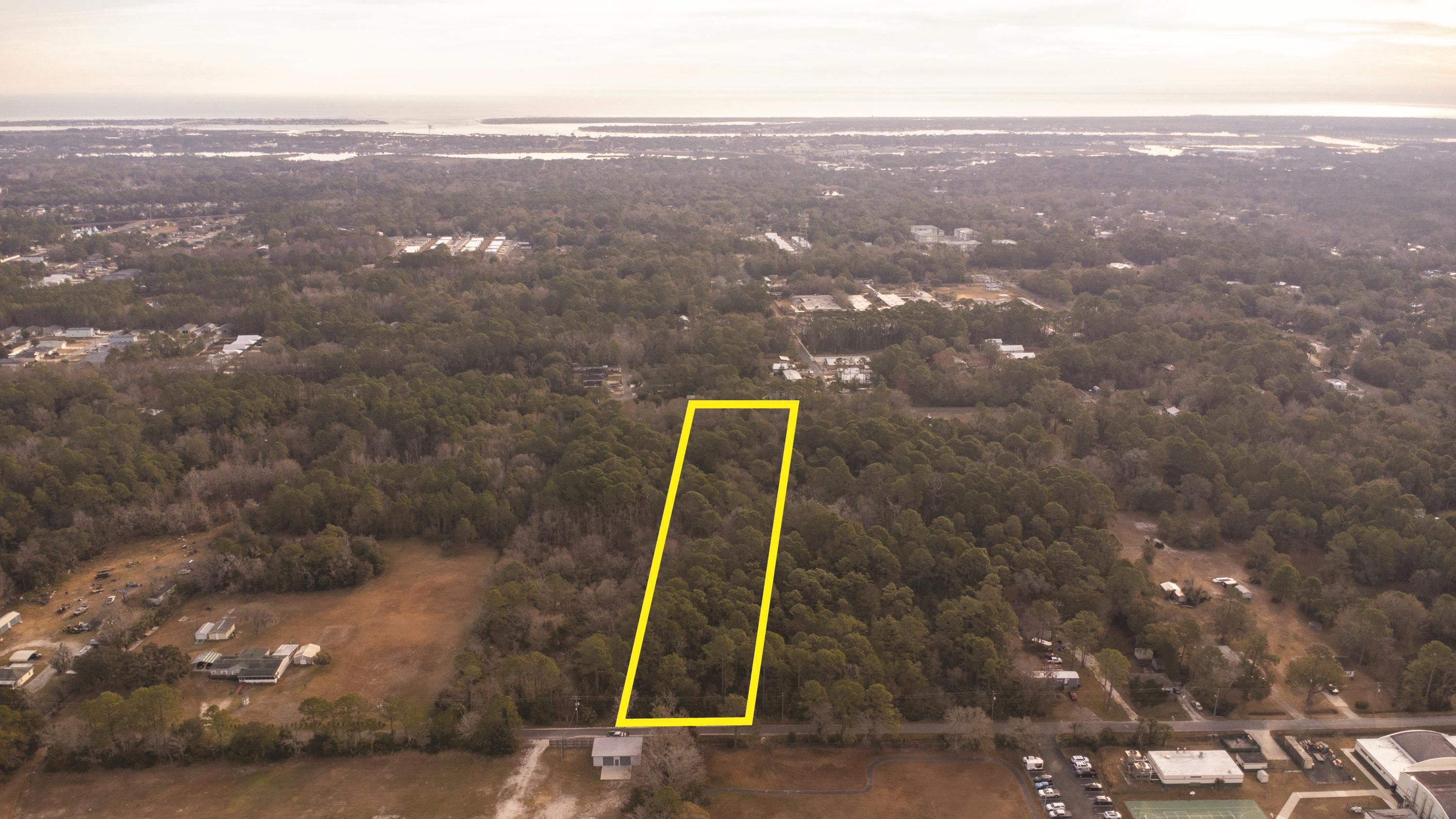 0 North Clay Street St. Augustine, FL 32084 - Photo 20 of 21 Aerial view of property and surrounding area featuring property boundaries highlighted and a forest