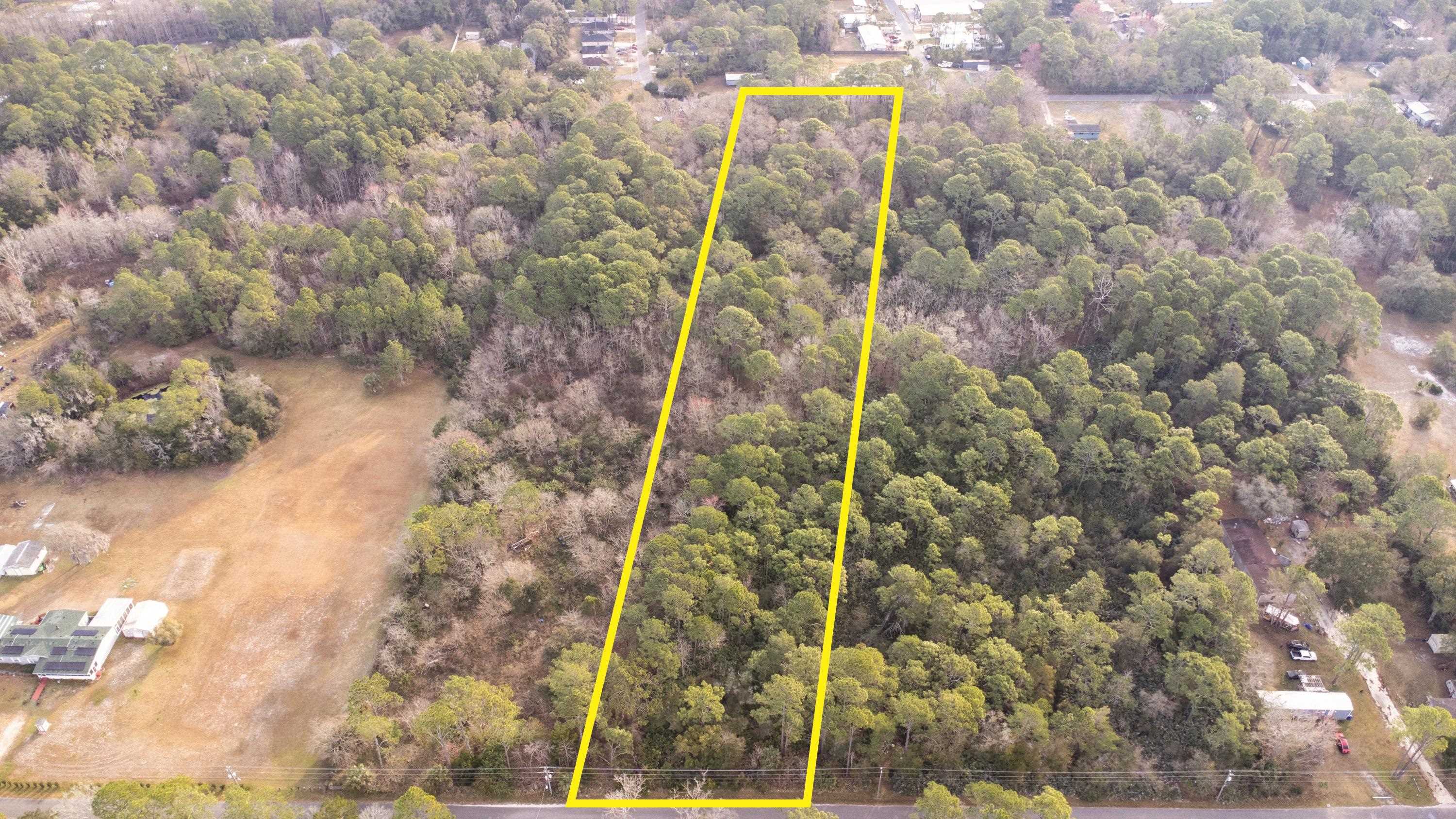 0 North Clay Street St. Augustine, FL 32084 - Photo 21 of 21 Aerial view of property and surrounding area with a forest and property boundaries highlighted