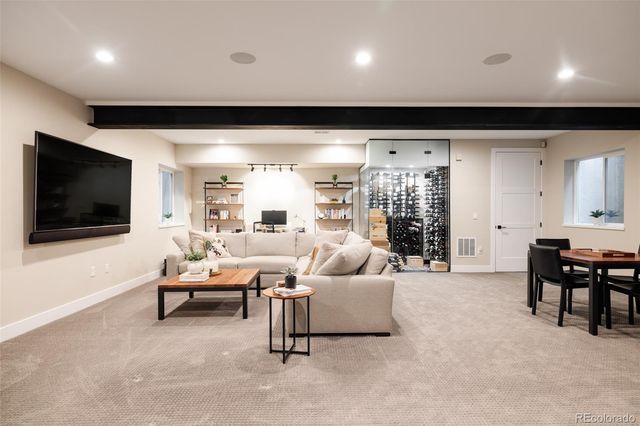 a living room with a couch and a table