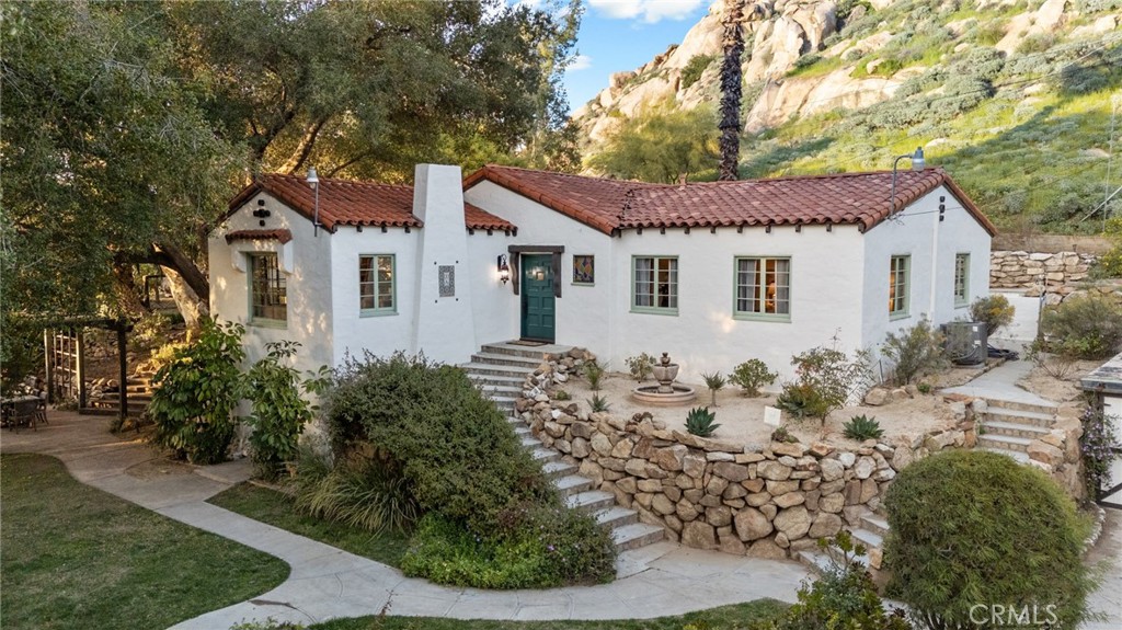 4855 Glenwood Drive Riverside, CA 92501 - Photo 1 of 39 a front view of a house with a yard