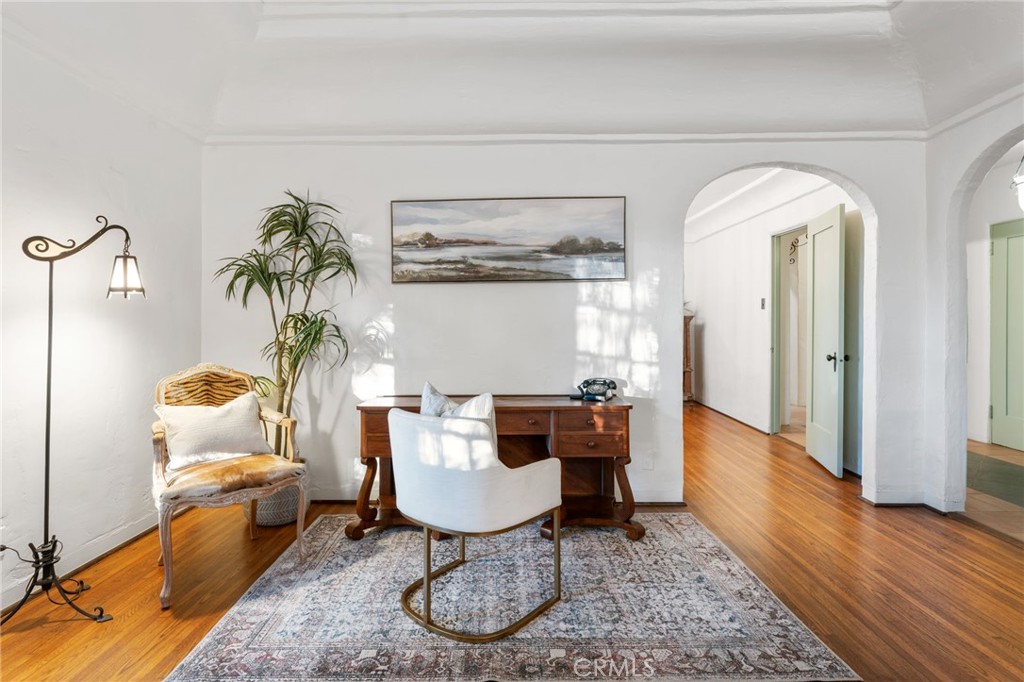 4855 Glenwood Drive Riverside, CA 92501 - Photo 11 of 39 a living room with furniture and a table