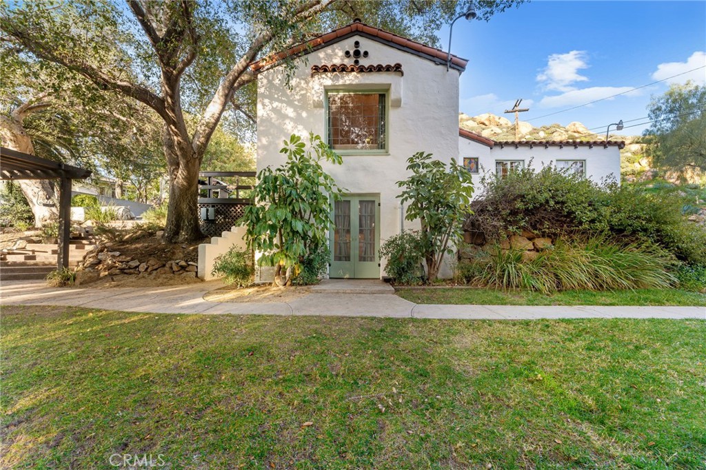 4855 Glenwood Drive Riverside, CA 92501 - Photo 17 of 39 a front view of a house with a yard
