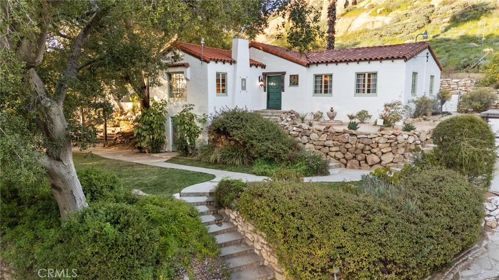 4855 Glenwood Drive Riverside, CA 92501 - Photo 2 of 39 a front view of a house with garden
