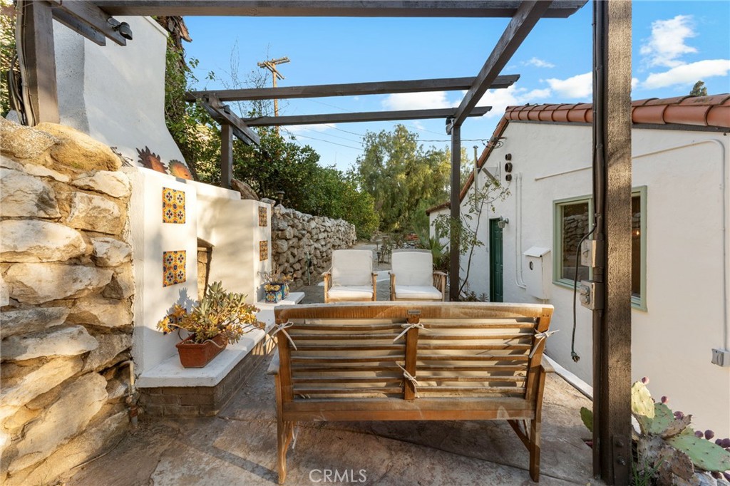 4855 Glenwood Drive Riverside, CA 92501 - Photo 33 of 39 a view of a balcony with chairs and a potted plant
