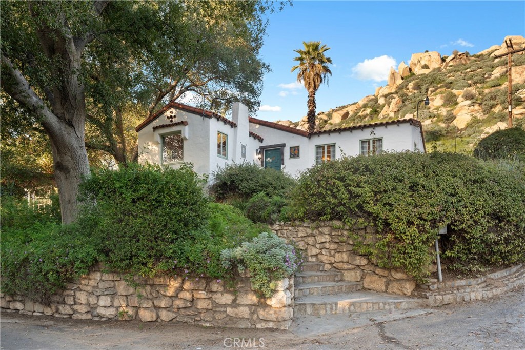 4855 Glenwood Drive Riverside, CA 92501 - Photo 5 of 39 front view of a house with a tree