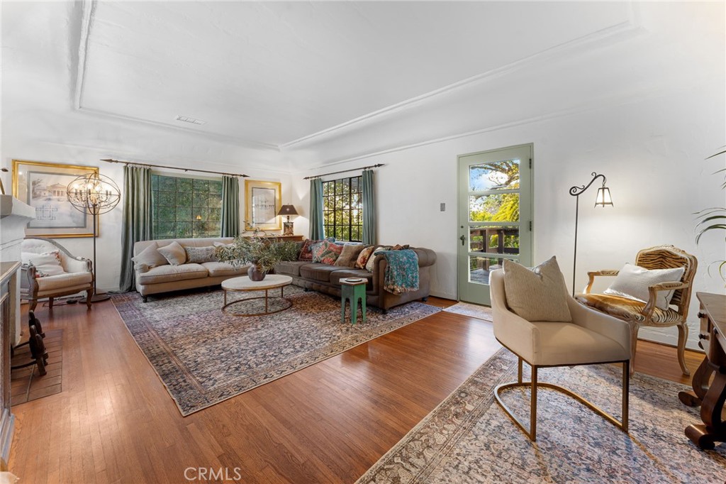 4855 Glenwood Drive Riverside, CA 92501 - Photo 9 of 39 a living room with furniture and wooden floor