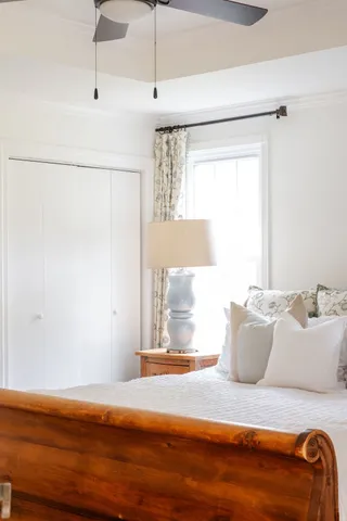 a view of a room with wooden floor and cabinet