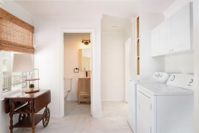 a room with a table and chairs