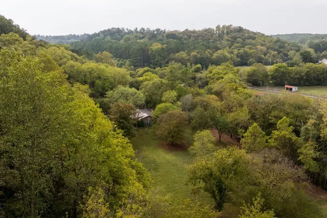 a view of a town with mountains in the background