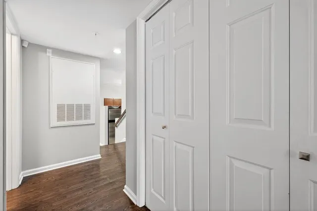 a view of entryway with wooden floor