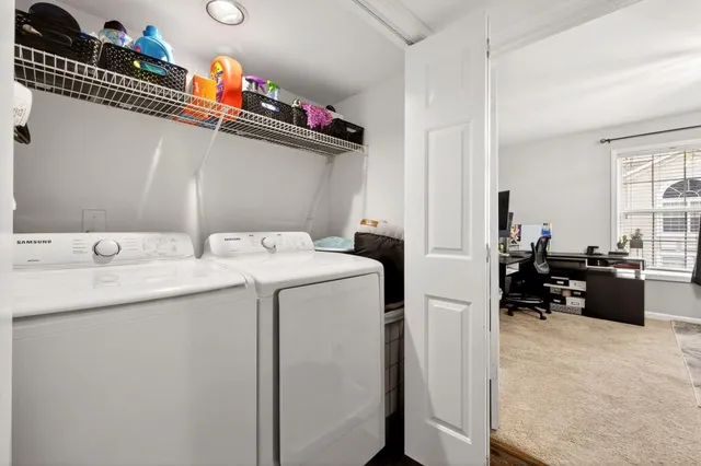 a utility room with dryer and washer