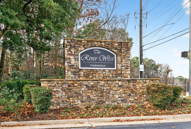 a sign that is on the side of a building