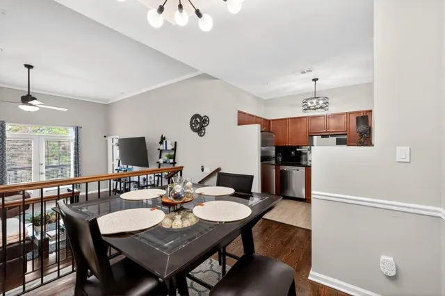 a view of a dining room with furniture