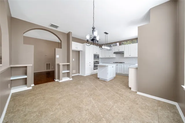 a view of a kitchen with a sink