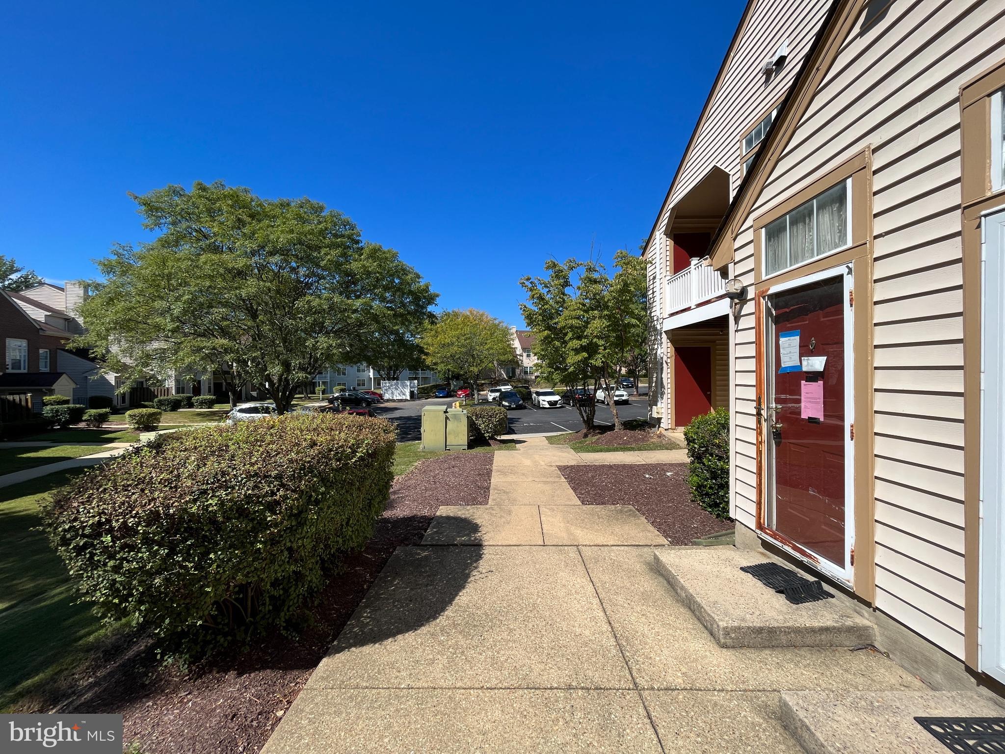 1152 Windemere Court Fort Washington, MD 20744 - Photo 2 of 22 a view of street with flower on side of building