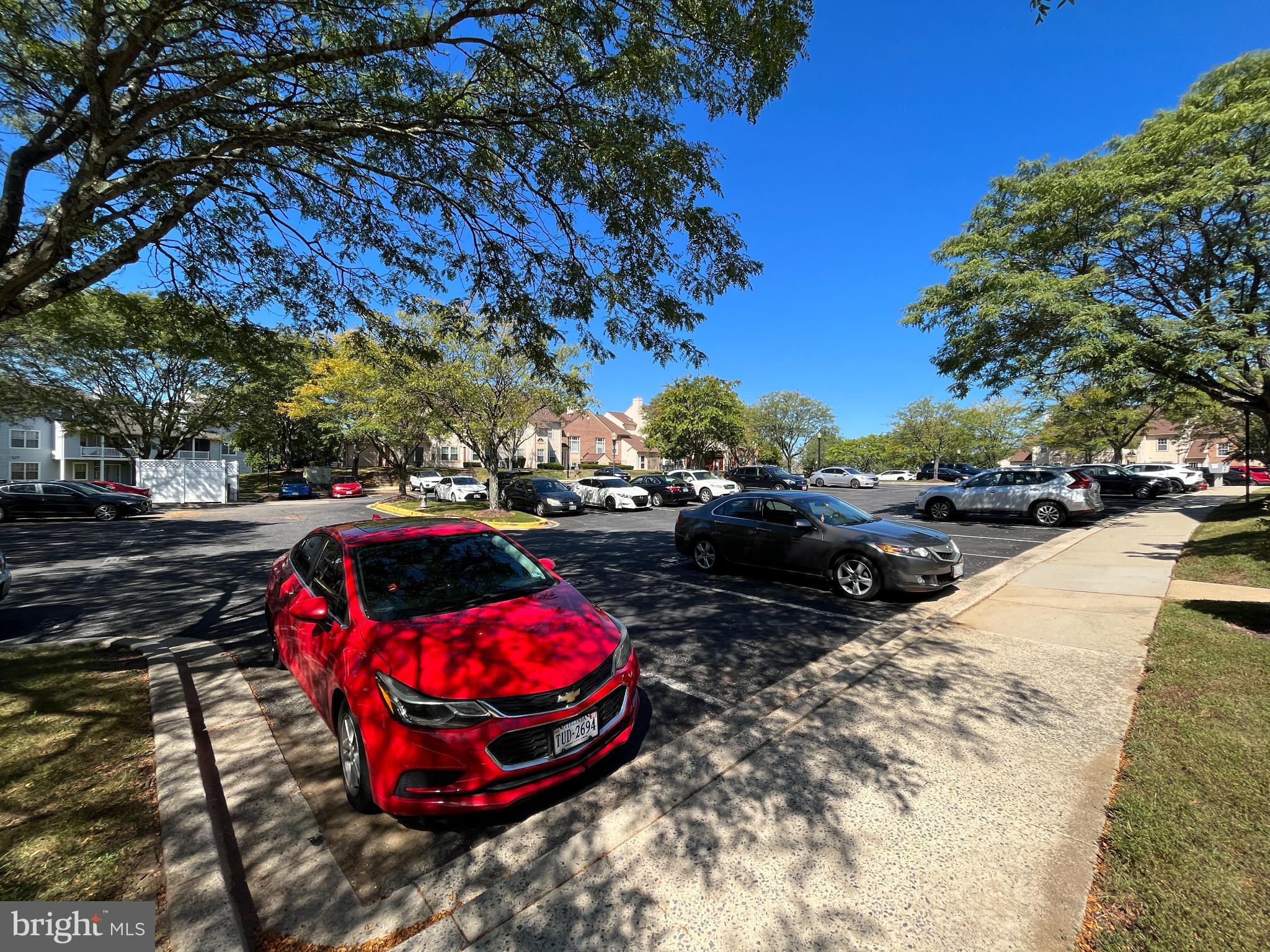 1152 Windemere Court Fort Washington, MD 20744 - Photo 22 of 22 a view of a backyard with table and chairs and a fire pit