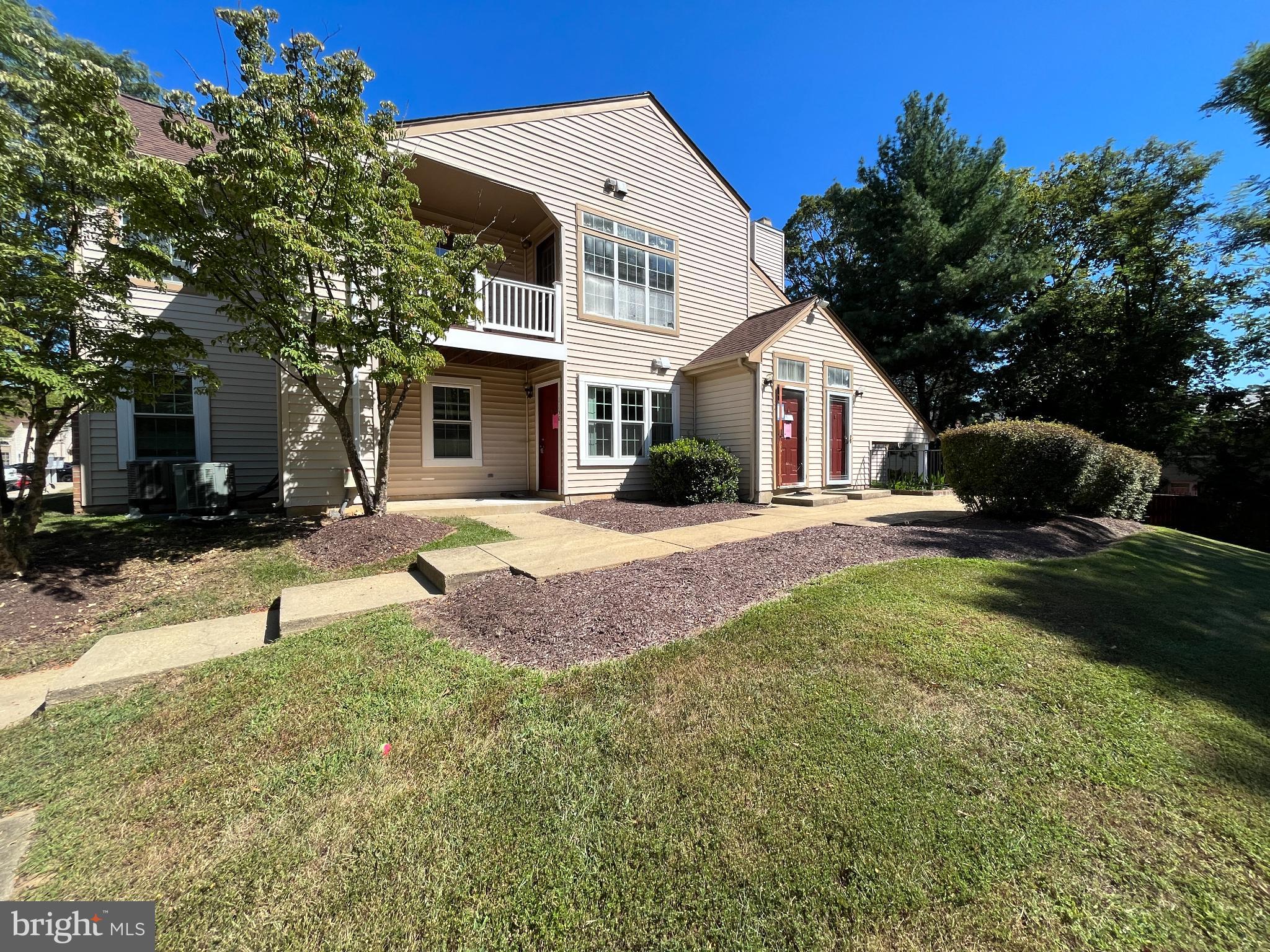1152 Windemere Court Fort Washington, MD 20744 - Photo 4 of 22 a front view of house with yard and green space