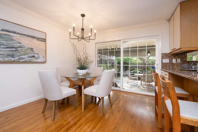 906 Bluebell Way Sunnyvale, CA 94086 - Photo 14 of 27 a view of a dining room with furniture window and wooden floor