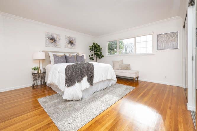 906 Bluebell Way Sunnyvale, CA 94086 - Photo 17 of 27 a bedroom with a bed and wooden floor