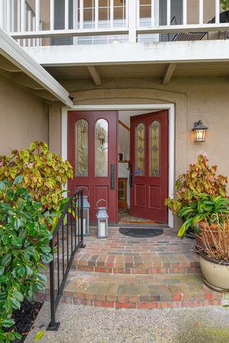 906 Bluebell Way Sunnyvale, CA 94086 - Photo 3 of 27 a front view of brick house with potted plants