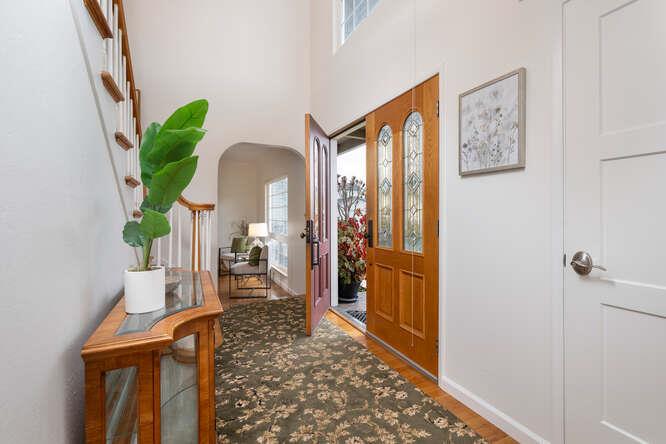 906 Bluebell Way Sunnyvale, CA 94086 - Photo 4 of 27 a living room with furniture and a wooden floor
