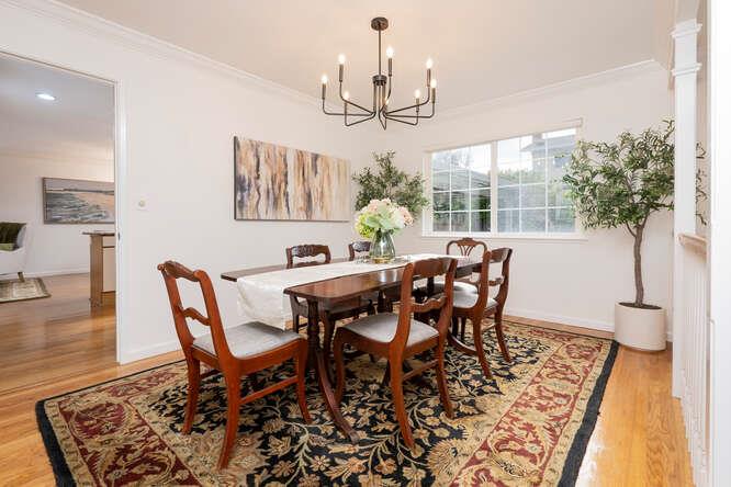 906 Bluebell Way Sunnyvale, CA 94086 - Photo 8 of 27 a dining room with furniture potted plants and wooden floor