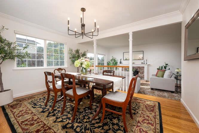 906 Bluebell Way Sunnyvale, CA 94086 - Photo 9 of 27 a dining room with furniture a chandelier and wooden floor