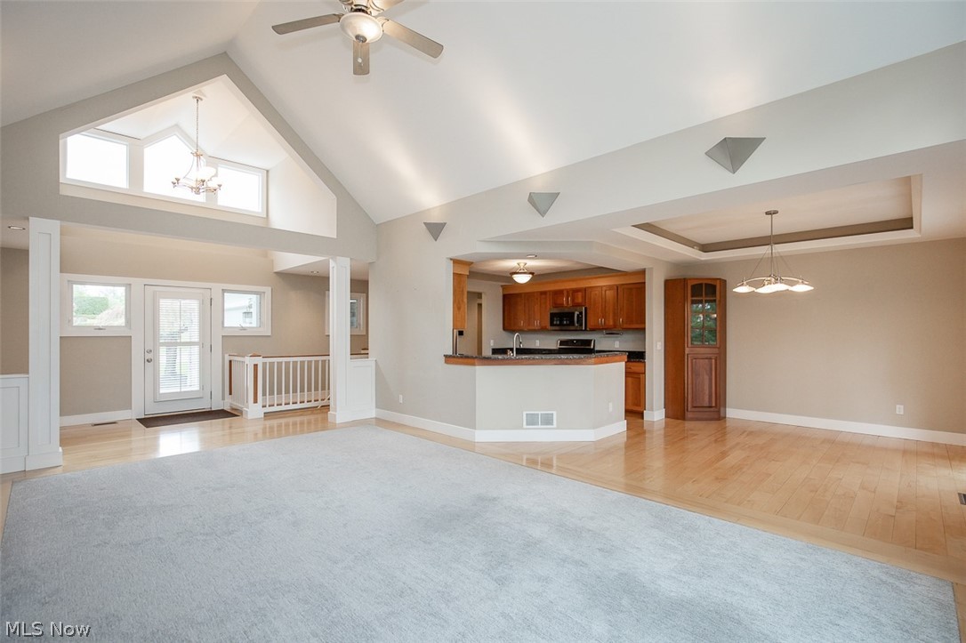 7282 Holzhauer Road Northfield, OH 44067 - Photo 5 of 47 Living room open to dining area and kitchen