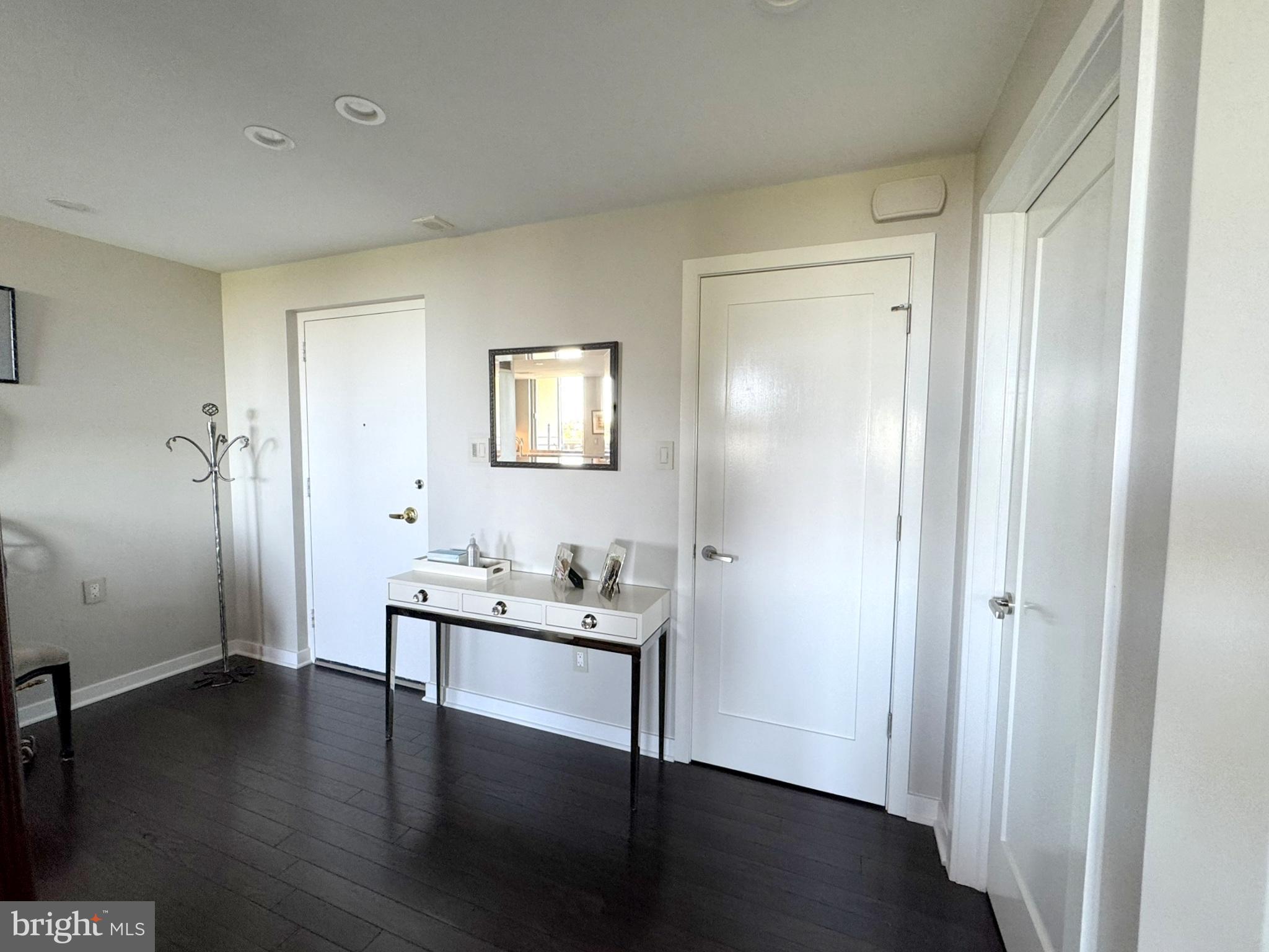 191 Presidential Boulevard, Unit R828 Bala Cynwyd, PA 19004 - Photo 13 of 50 a view of a room with wooden floor windows and cabinet
