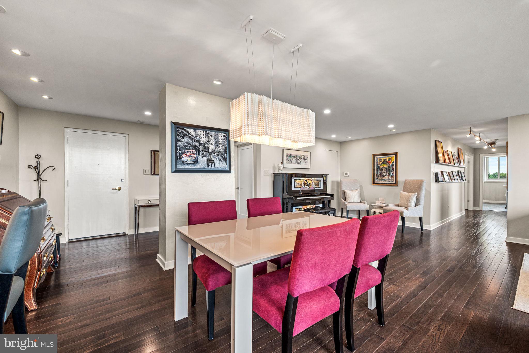 191 Presidential Boulevard, Unit R828 Bala Cynwyd, PA 19004 - Photo 15 of 50 a view of a dining room with furniture and wooden floor