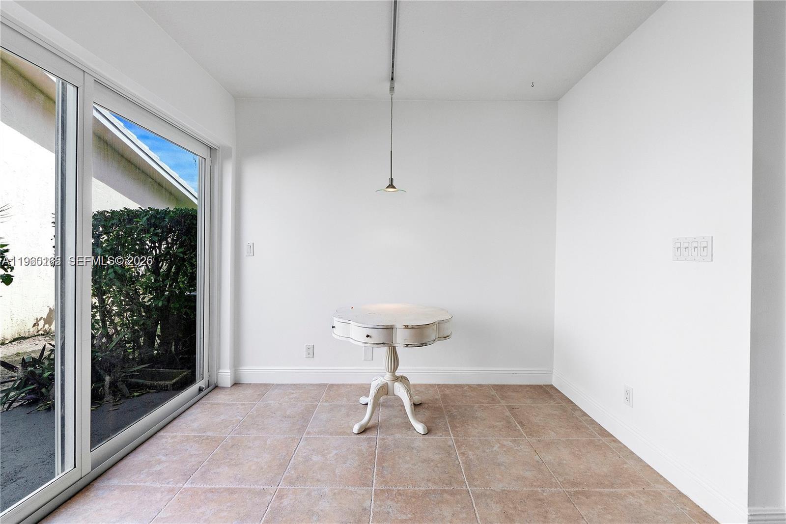5667 North Cameo Drive Boca Raton, FL 33433 - Photo 24 of 32 a bathroom with a sink and glass door