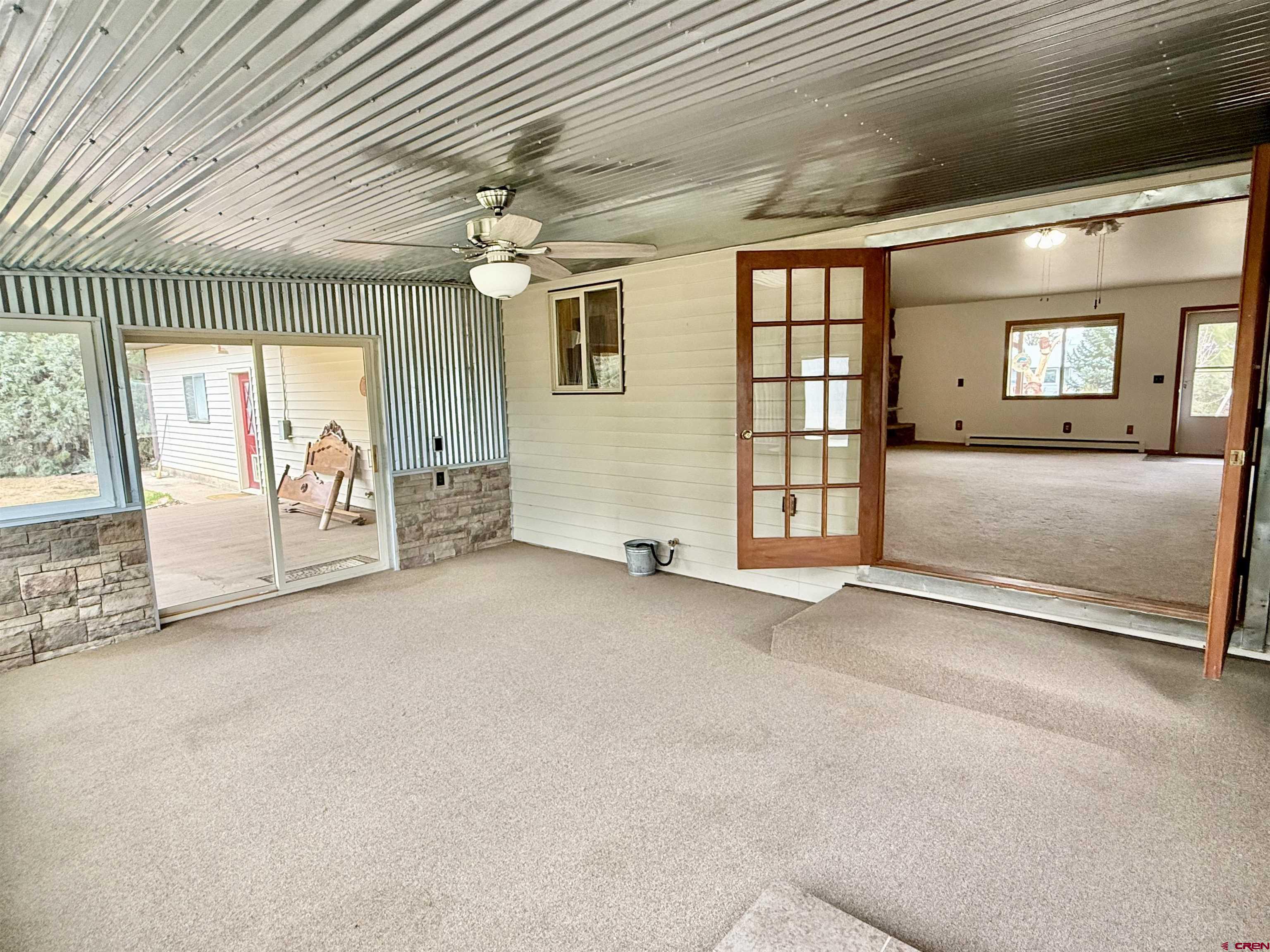 14894 Deer Run Road Delta, CO 81416 - Photo 12 of 40 en empty room with windows