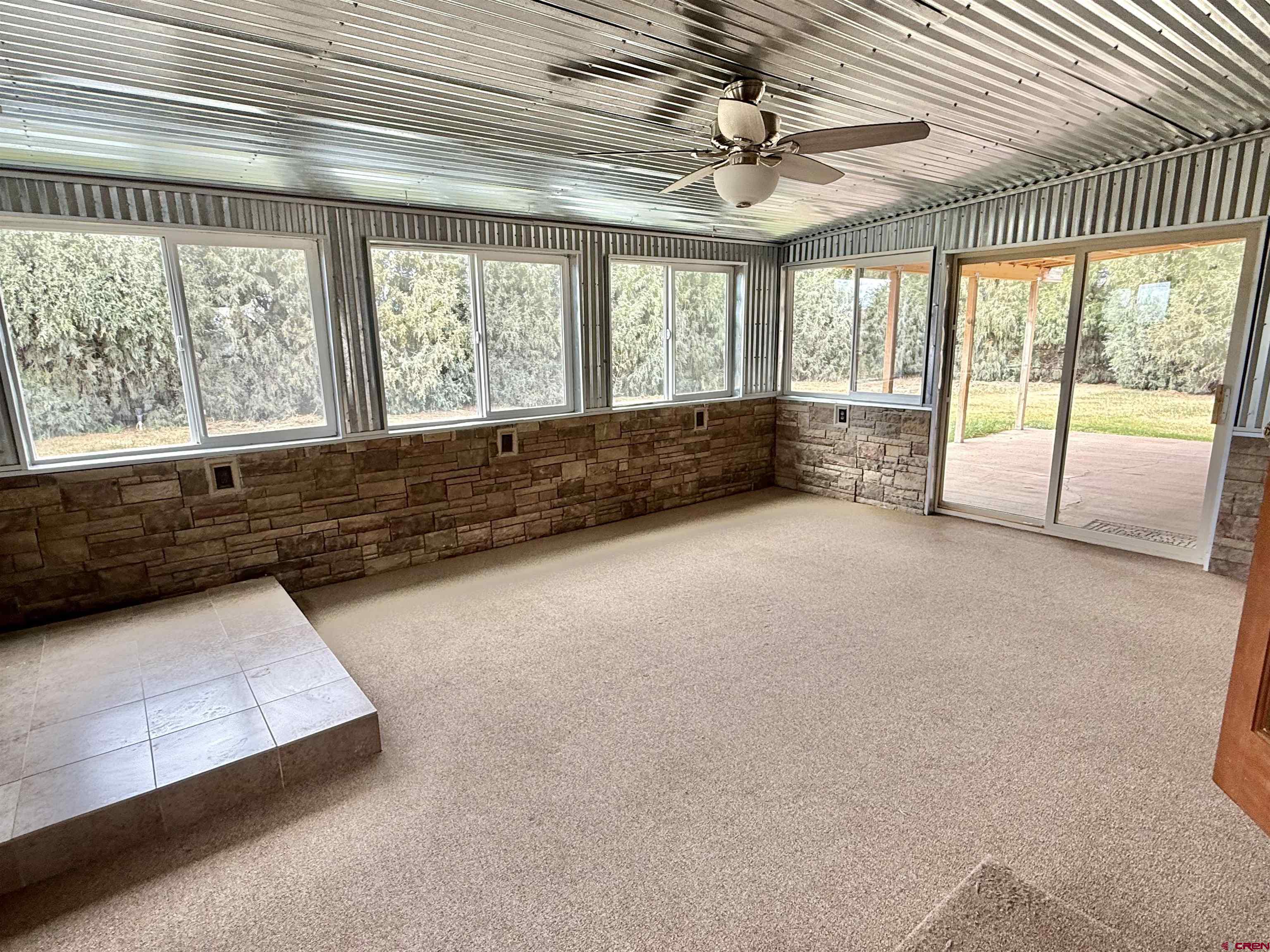 14894 Deer Run Road Delta, CO 81416 - Photo 13 of 40 a large room with a large window