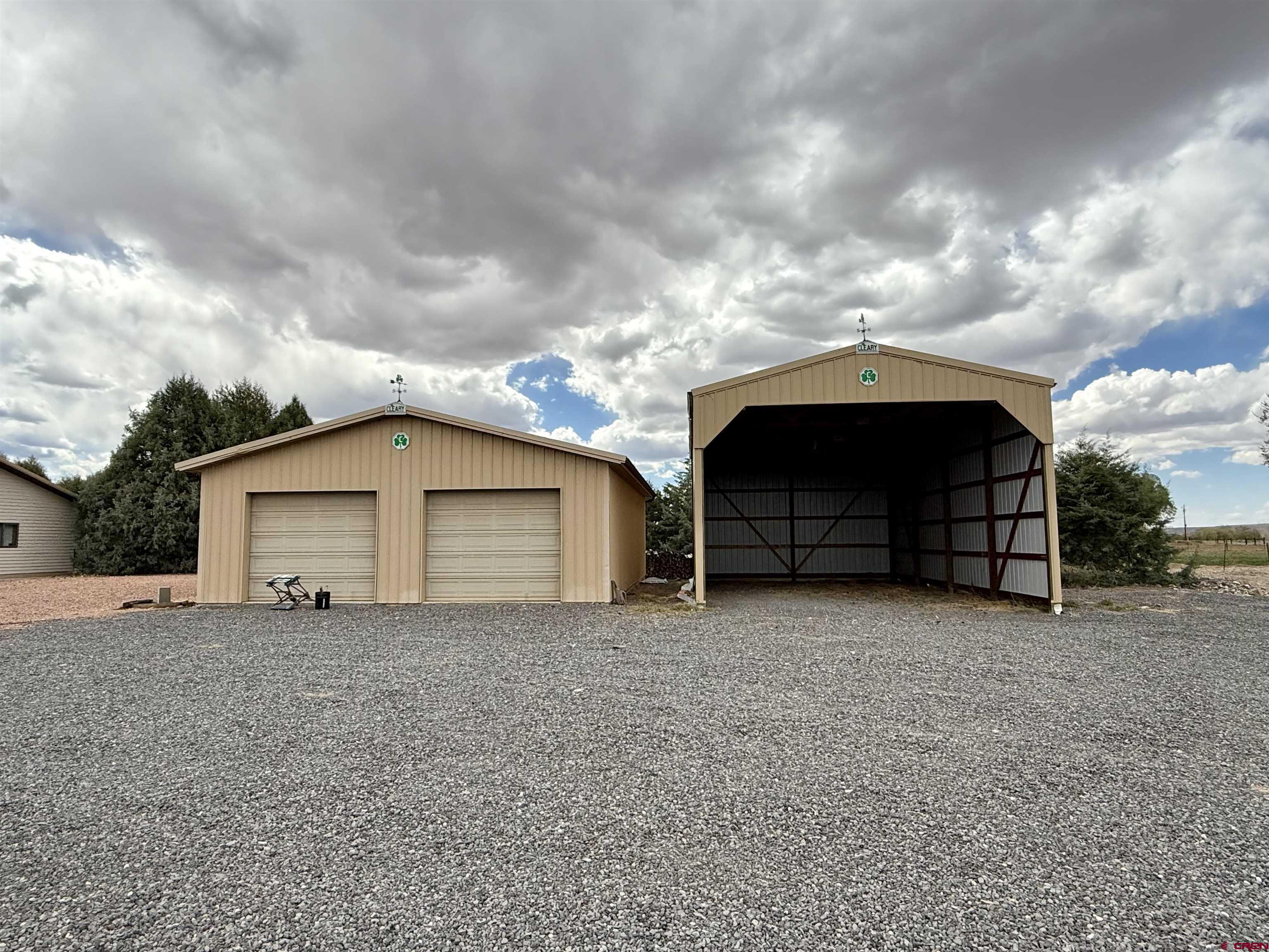 14894 Deer Run Road Delta, CO 81416 - Photo 25 of 40 a view of a house with a yard